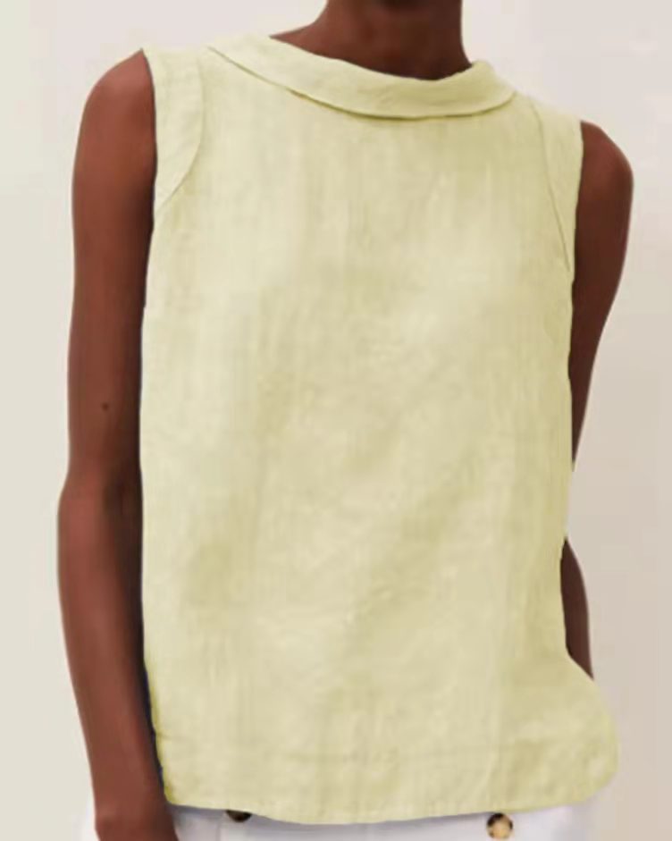 Light green sleeveless top worn by a person on a plain background
