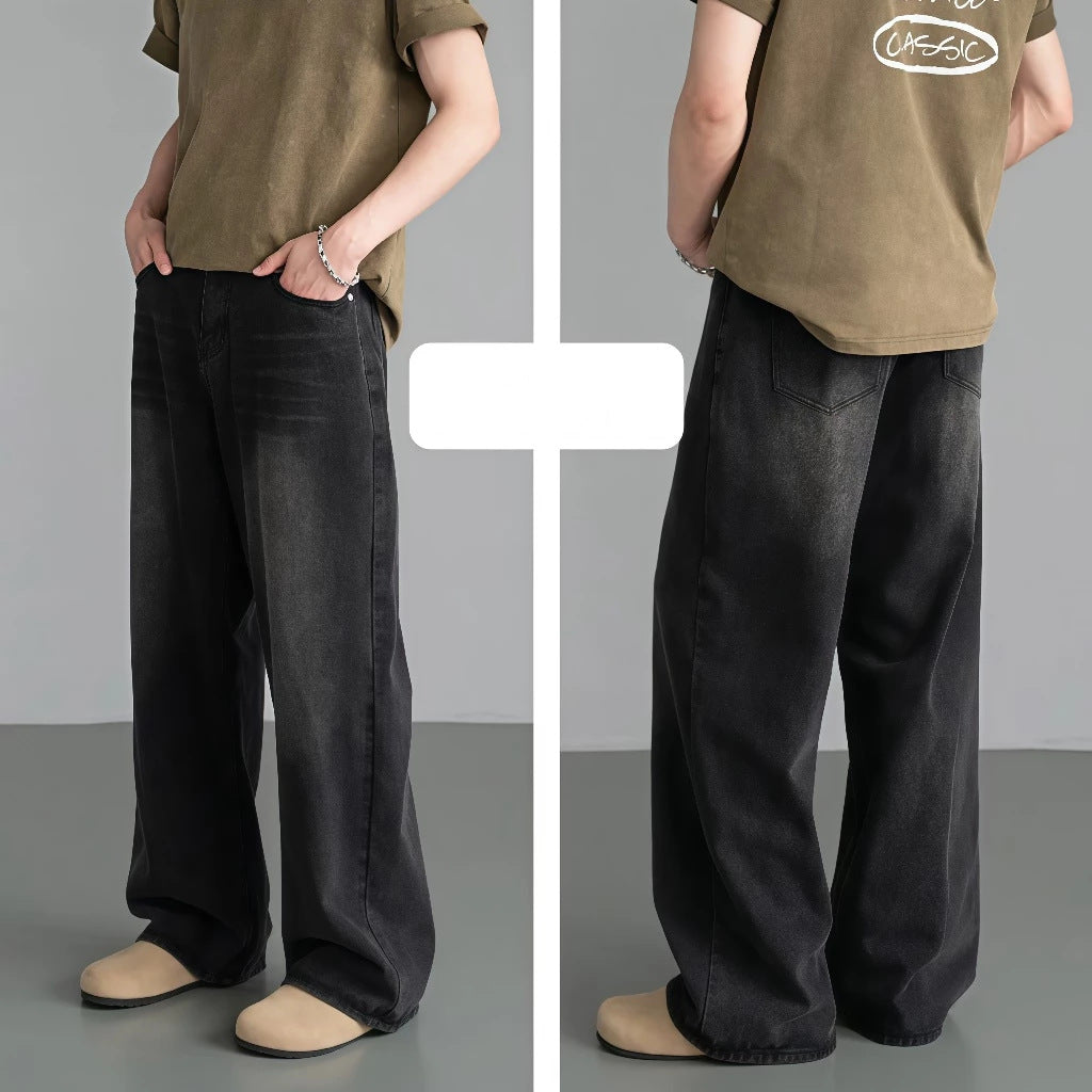 Person wearing a green shirt and black pants on a gray background