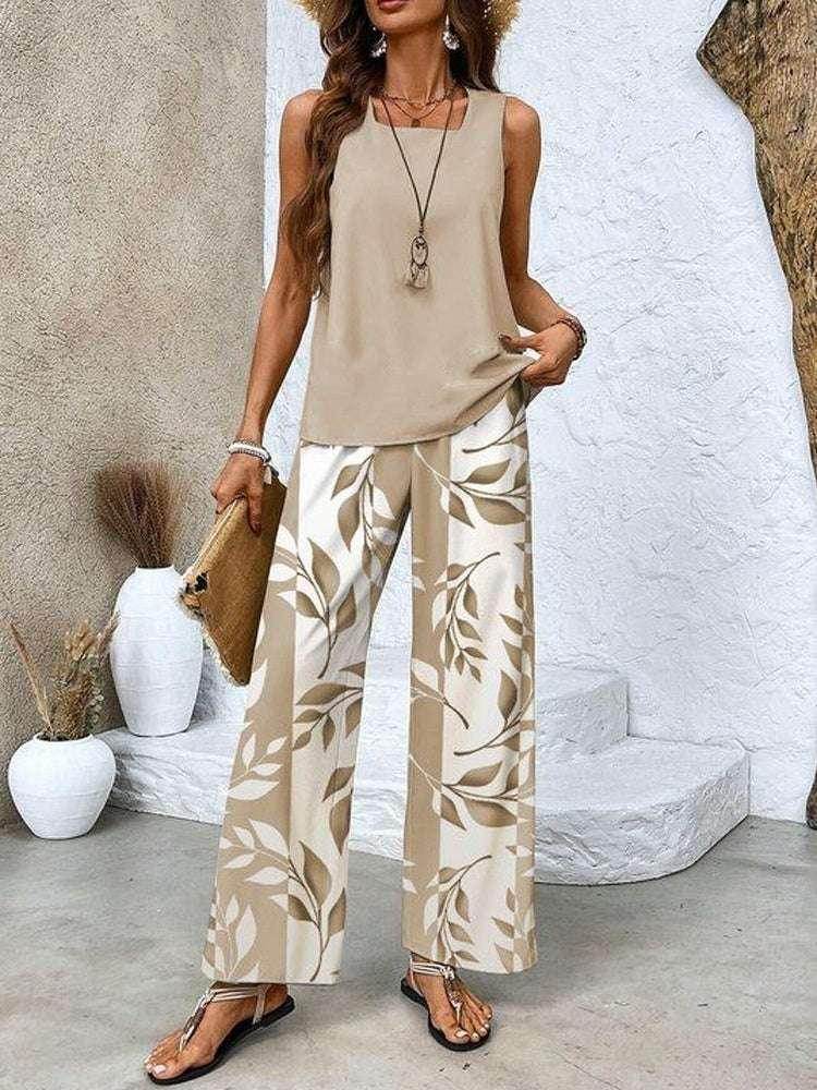 Woman wearing beige sleeveless top and wide-leg leaf print pants from ZA-Zola fashion UK