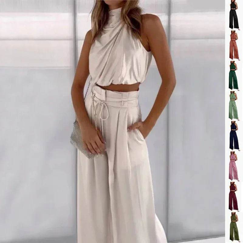 Woman wearing stylish cream satin crop top and wide-leg pants set from ZA-Zola fashion collection