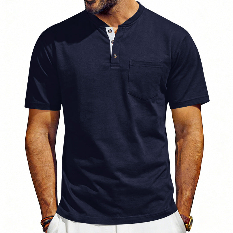 Navy blue short-sleeve henley shirt worn by a person on a white background