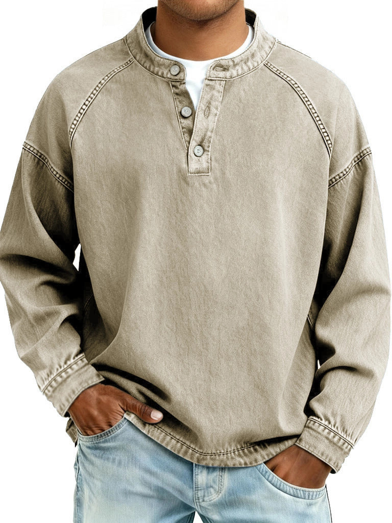 Man wearing a beige long-sleeve shirt with button details on a white background