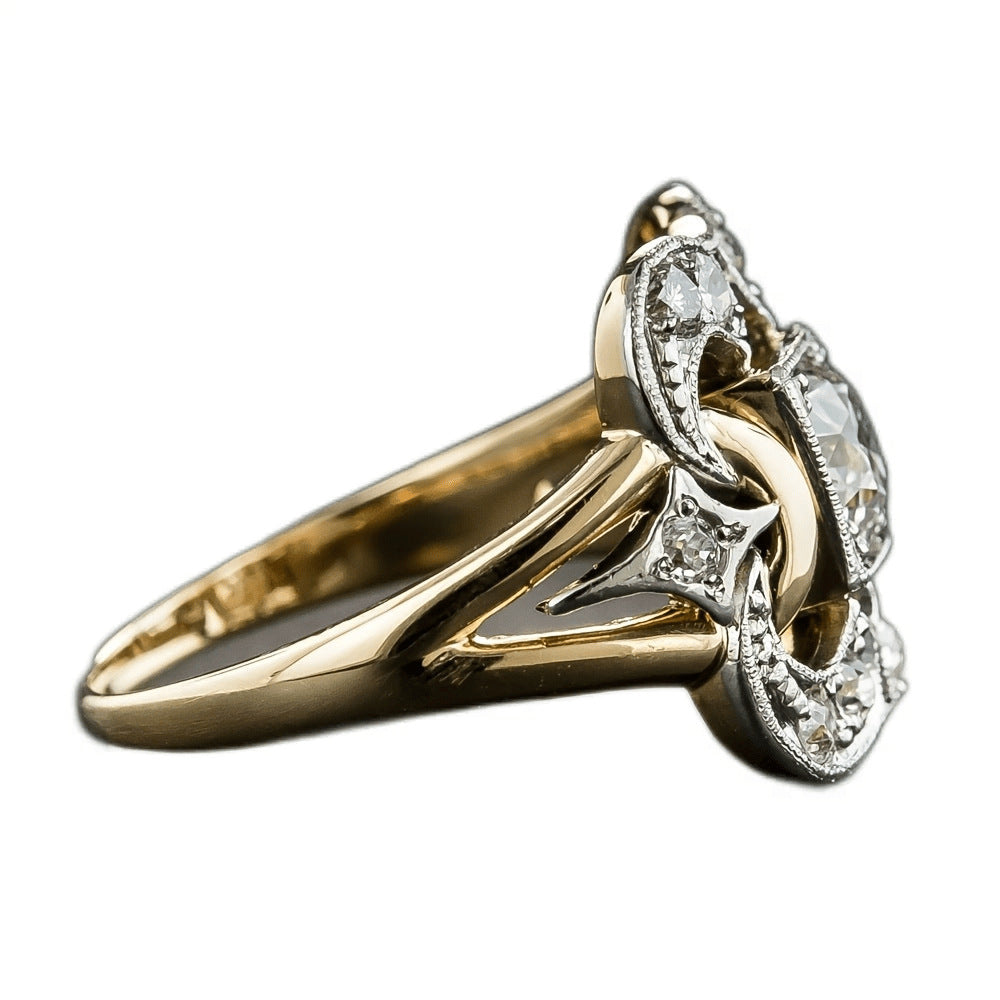 Gold ring with diamond accents on a white background