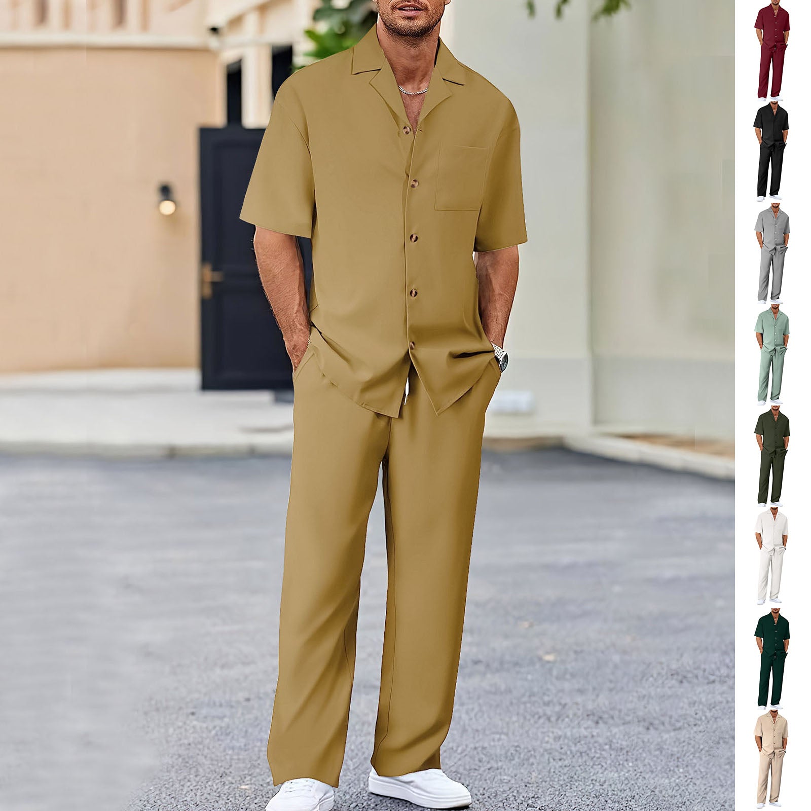Man wearing a beige outfit with a matching shirt and pants, standing outdoors.