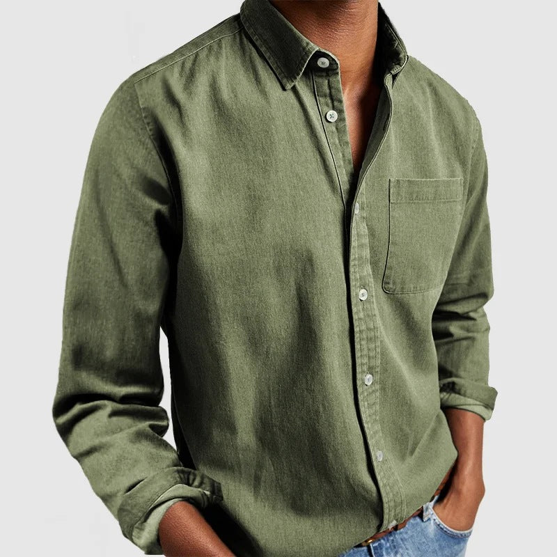 Green button-up shirt worn by a person on a light gray background