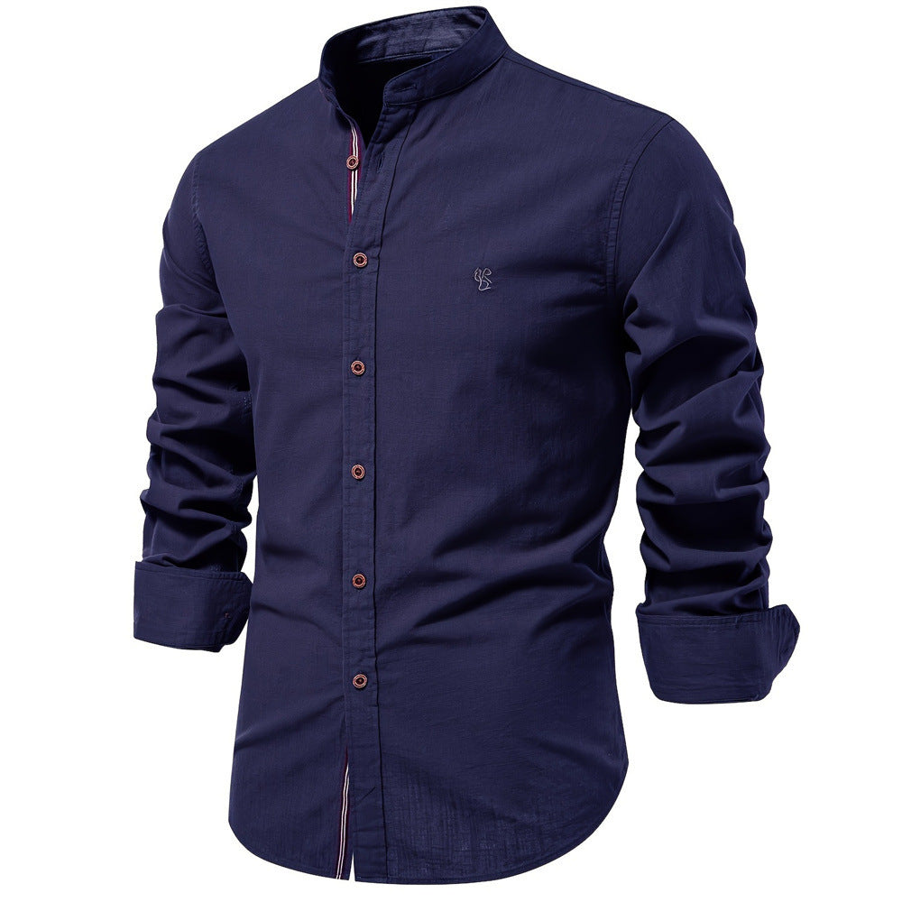 Navy blue shirt with rolled-up sleeves on a white background