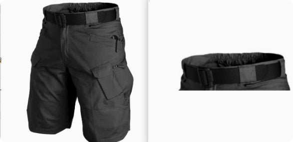 Black tactical shorts with multiple pockets and a belt on a white background