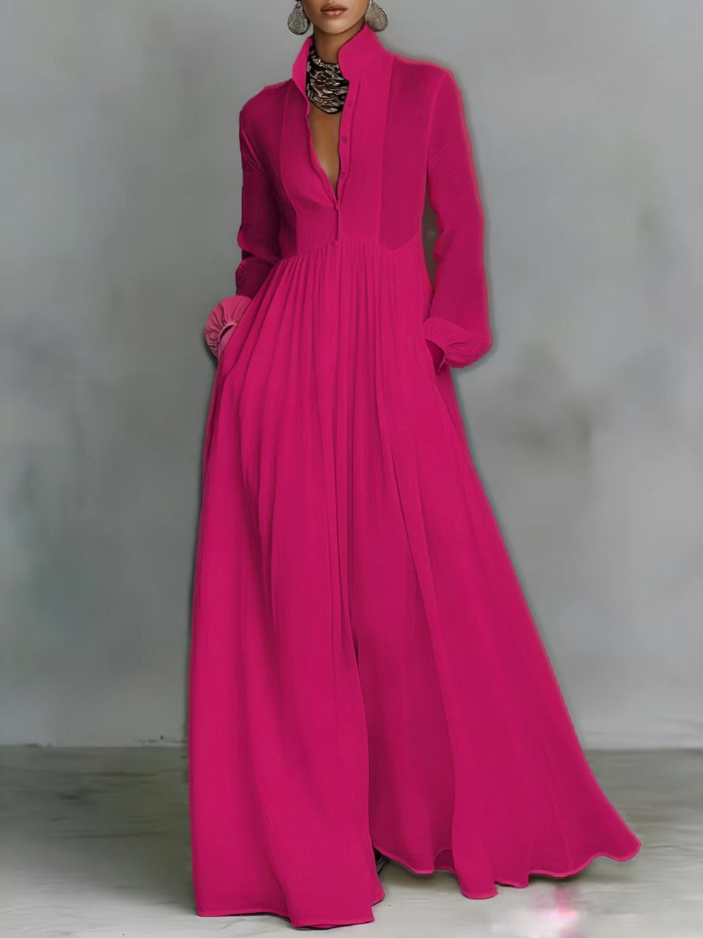 Fuchsia long-sleeve dress with a high collar on a plain background