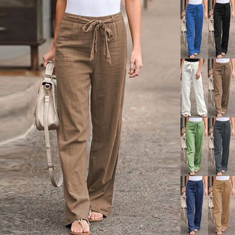 Brown pants worn by a person on a street with multiple color options displayed.