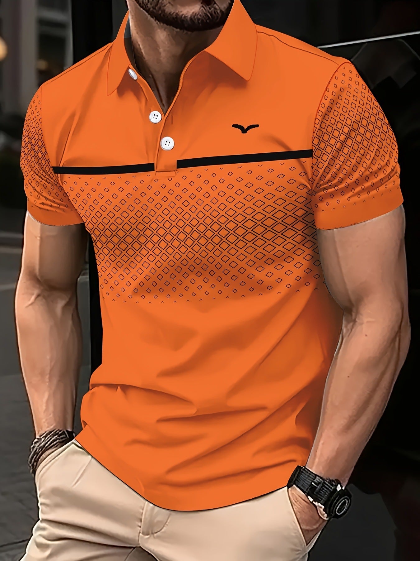 Orange polo shirt with geometric pattern worn by a person, blurred background