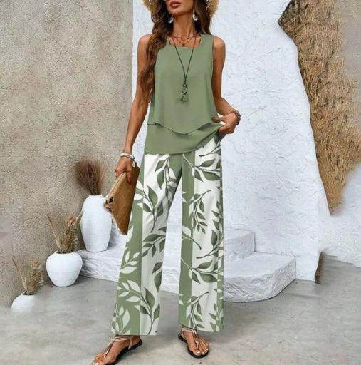Woman in sage green sleeveless top and botanical print wide-leg trousers, ZA-Zola fashion