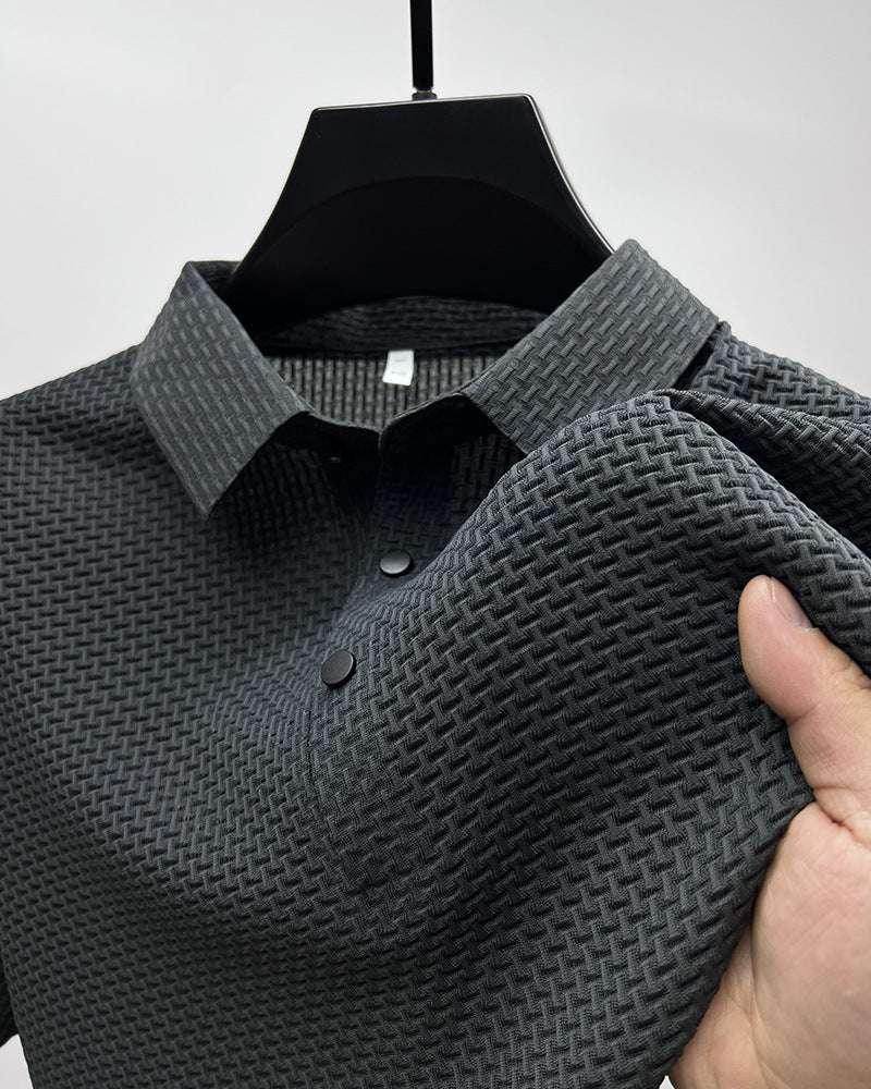 Textured black polo shirt with button collar from ZA-Zola, displayed on hanger