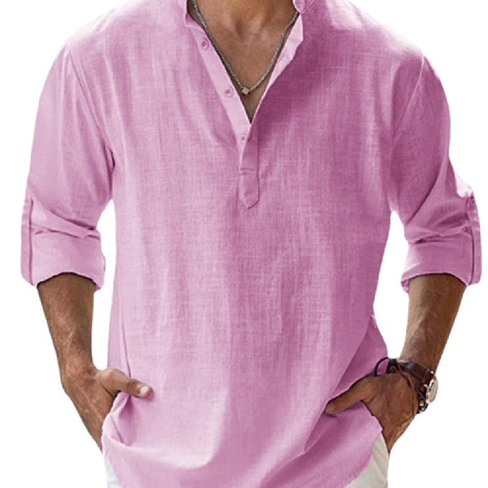 Pink long-sleeve shirt worn by a person on a white background