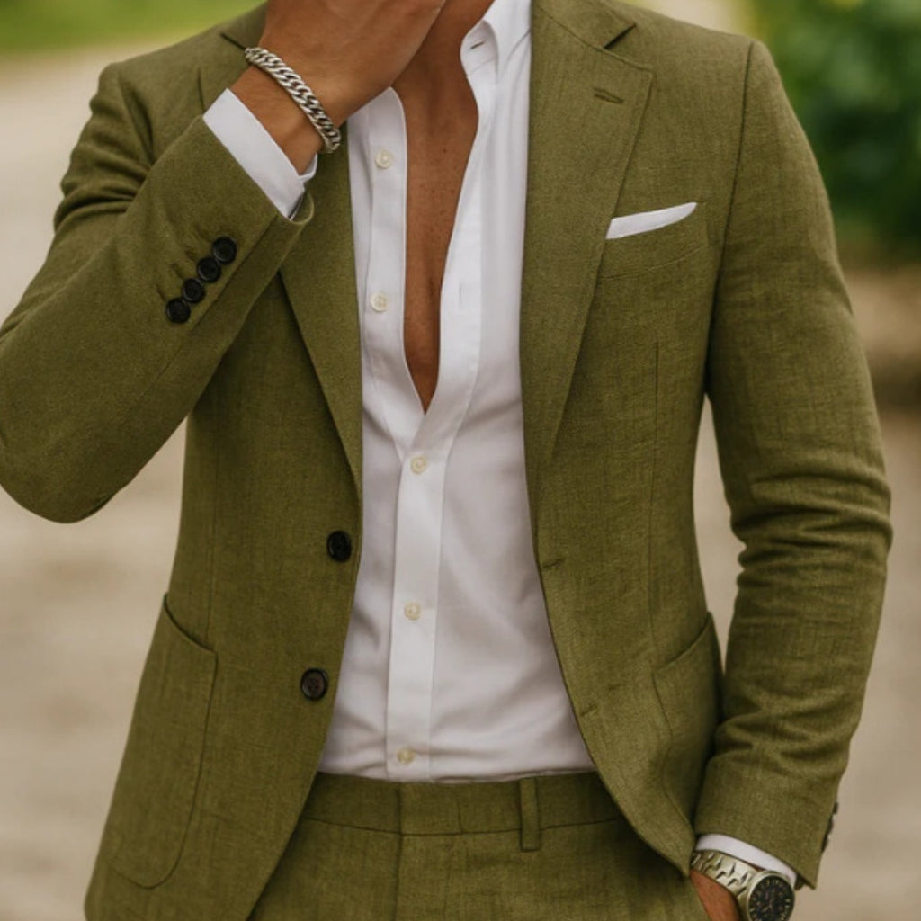 Green suit jacket over a white shirt with a blurred background