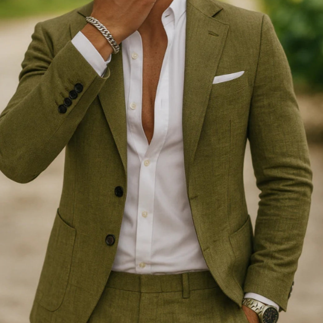 Green suit jacket over a white shirt with a blurred background