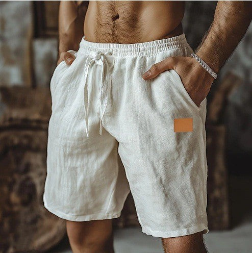 Man wearing white shorts with a blurred background