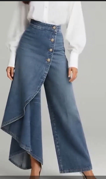 Blue denim skirt with button details worn by a person on a plain background