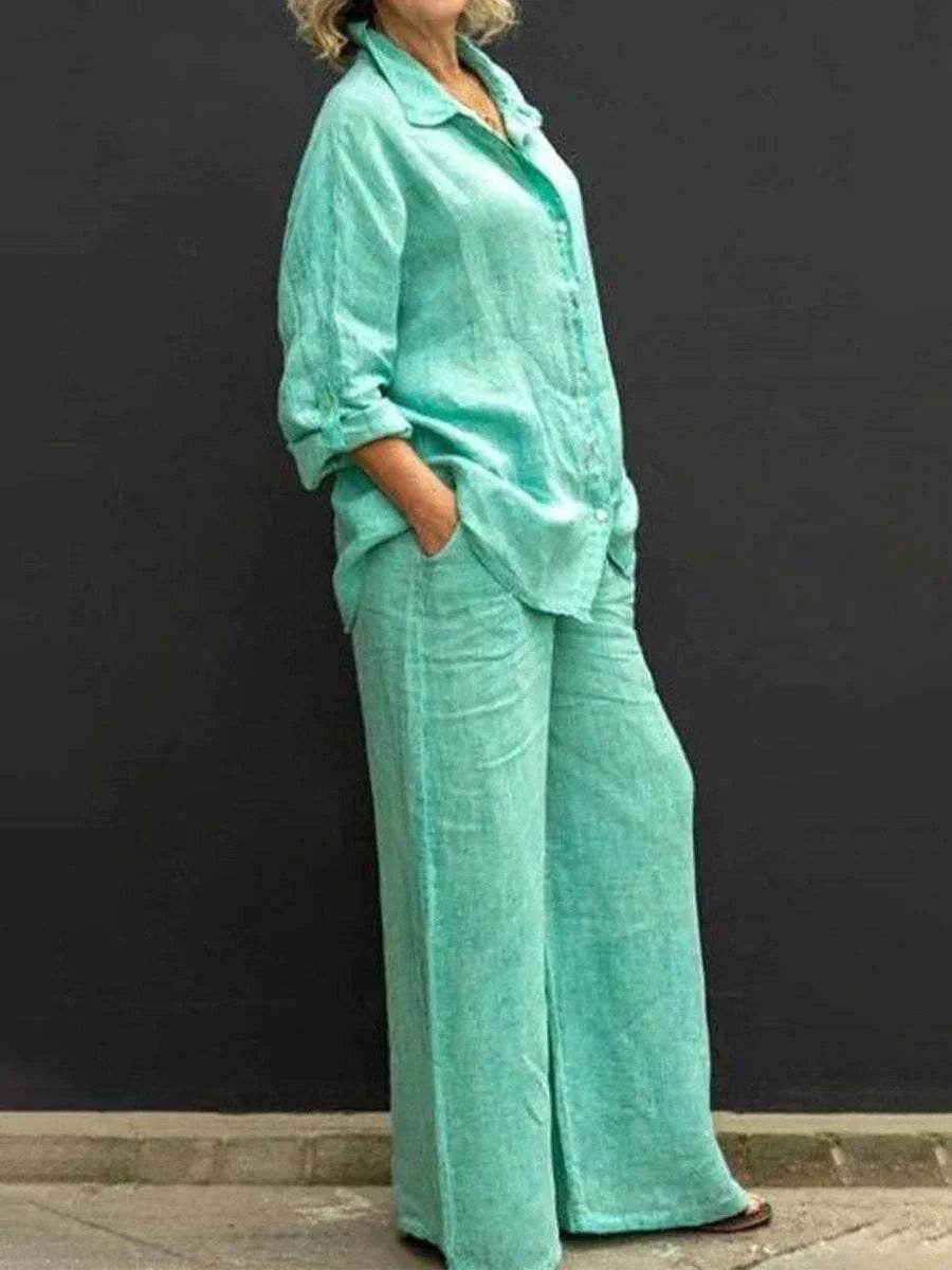 Woman wearing a mint green linen shirt and wide-leg pants, ZA-Zola fashion style