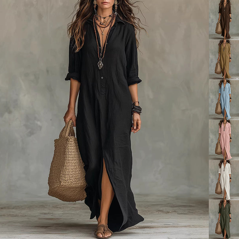Woman wearing a black dress holding a woven bag against a gray background