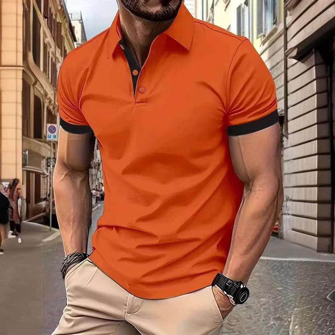 Man in urban street wearing bright orange short-sleeve polo shirt, beige pants, ZA-Zola fashion.