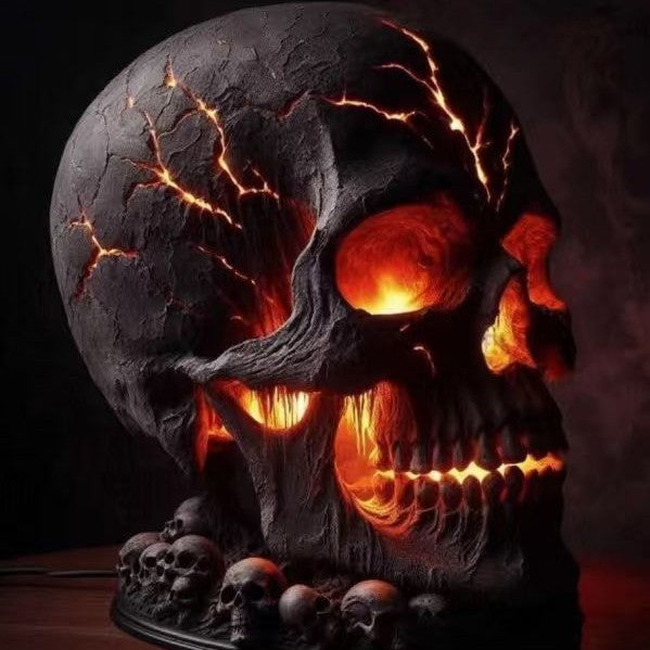 Glowing skull sculpture with fiery interior on a dark background