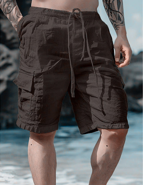 Person wearing brown cargo shorts with a blurred natural background