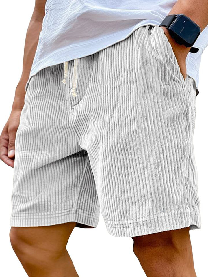 White striped shorts worn by a person on a white background