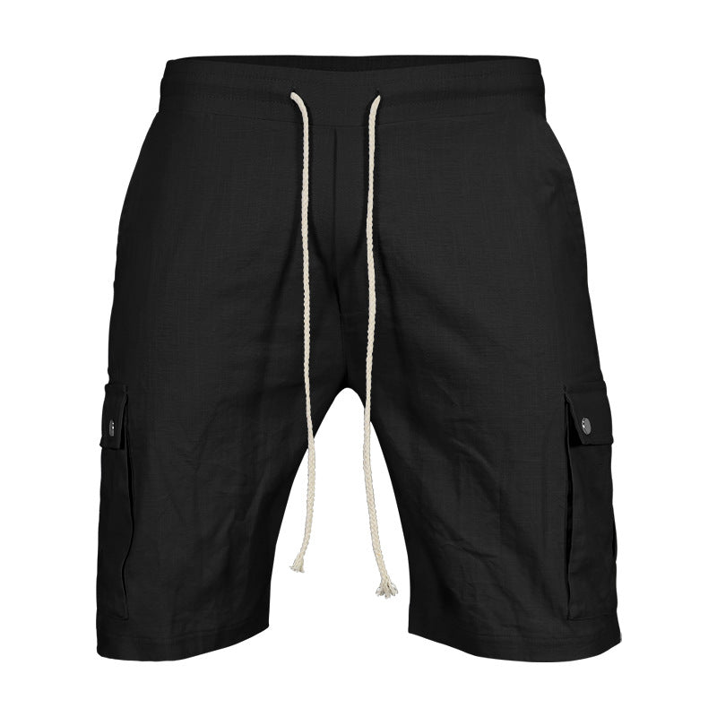 Black cargo shorts with a drawstring on a white background