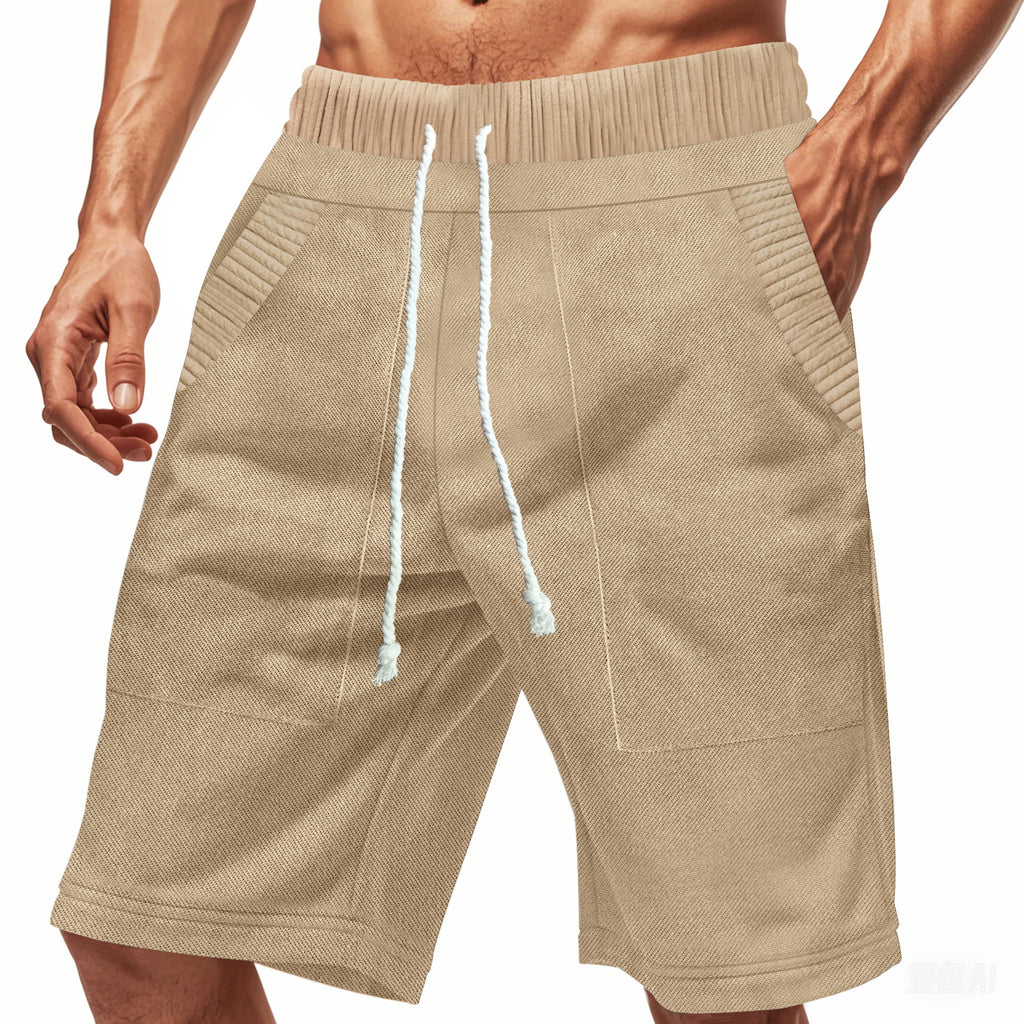 Beige shorts with a drawstring on a white background