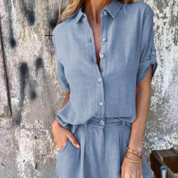 Woman wearing a light blue button-up shirt and matching shorts, trendy fashion from ZA-Zola