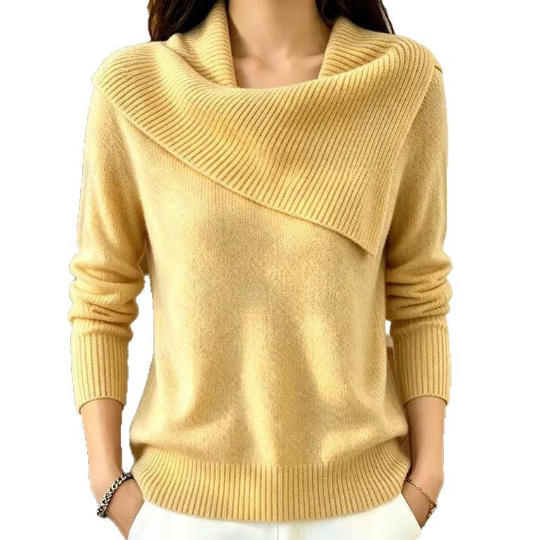 A woman wearing a pale yellow knit sweater with a wide draped cowl neckline, long sleeves, and ribbed cuffs and hem, shown against a plain white background.
