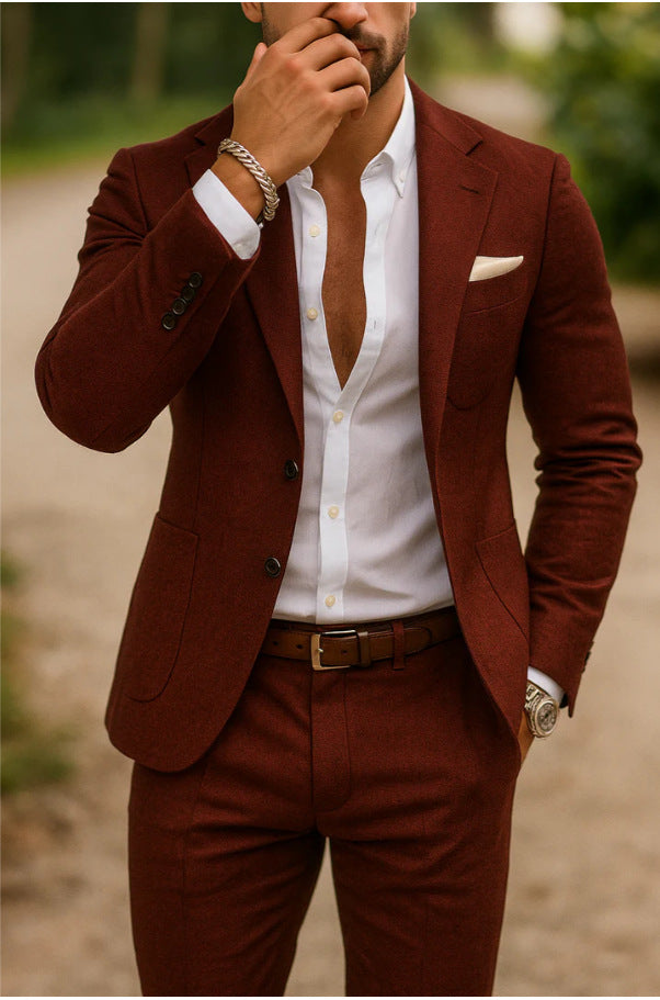 Man wearing a brown suit with a white shirt outdoors