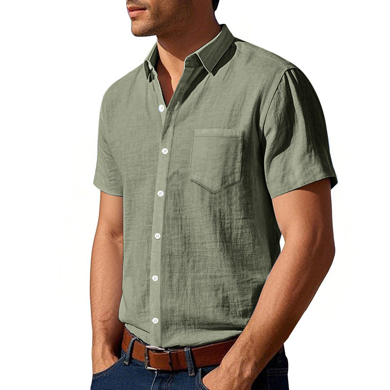 Man wearing a green short-sleeve shirt on a white background