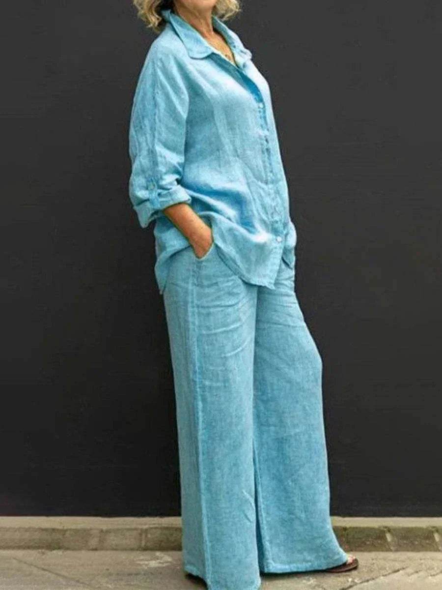 Woman wearing light blue linen shirt and wide-leg pants, trendy fashion ZA-Zola United Kingdom