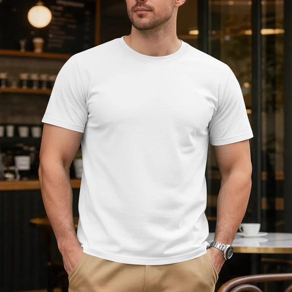 Man wearing a plain white t-shirt in an indoor setting