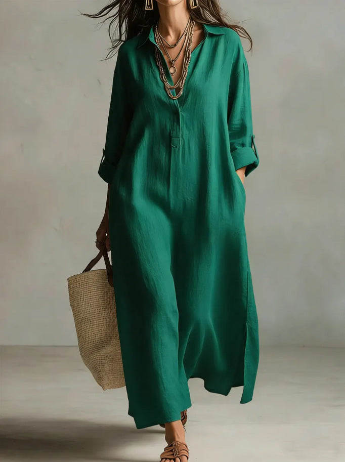 Woman wearing a green dress holding a woven bag against a neutral background