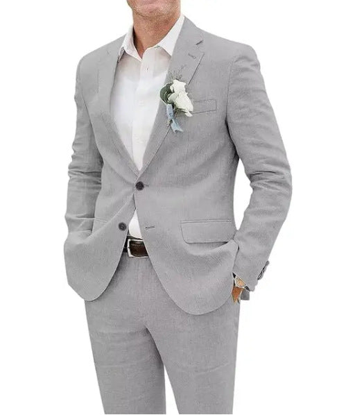 Gray suit with a white shirt and boutonniere on a white background