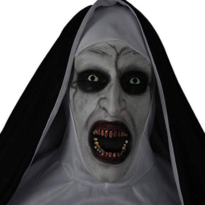 Horror-themed mask with glowing eyes and a dark hood