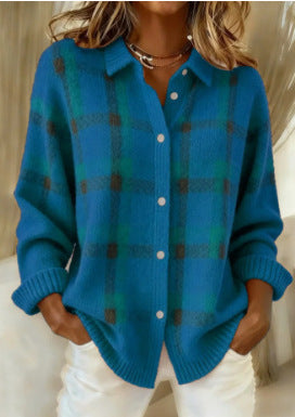 Blue plaid sweater worn by a person on a neutral background