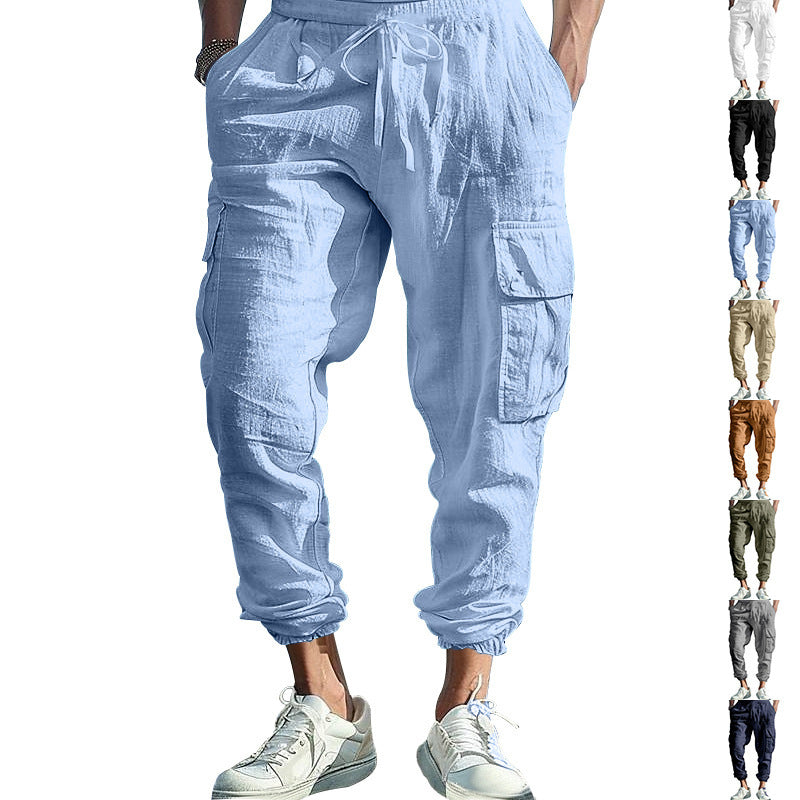 Light blue cargo jogger pants worn by a person on a white background with multiple color options displayed below.