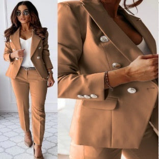 Woman wearing a brown suit with close-up details on buttons.