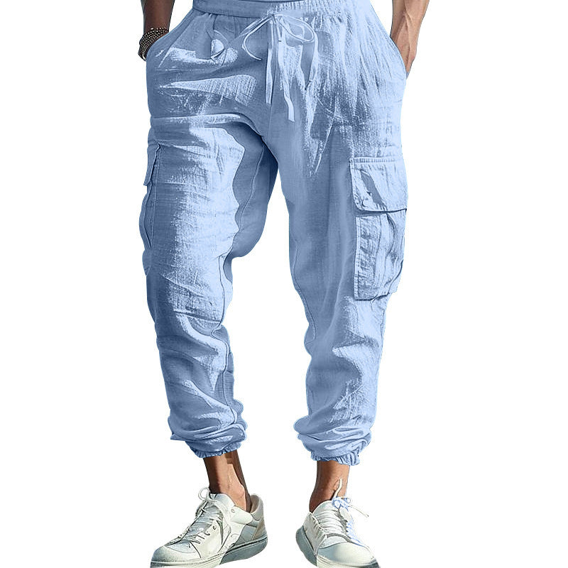 Light blue cargo jogger pants worn by a person on a white background