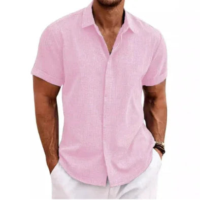 Man wearing a pink short-sleeve shirt on a white background