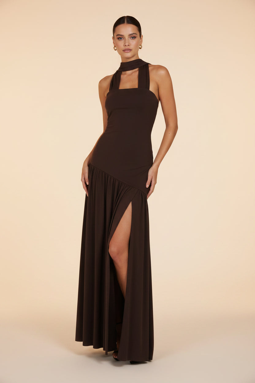 Brown halter neck dress on a white background