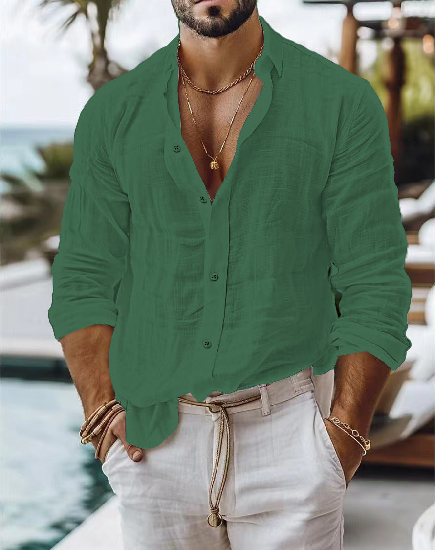 Man wearing a green shirt and beige pants by a poolside.