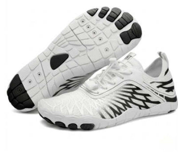 White athletic shoes with black accents on a white background