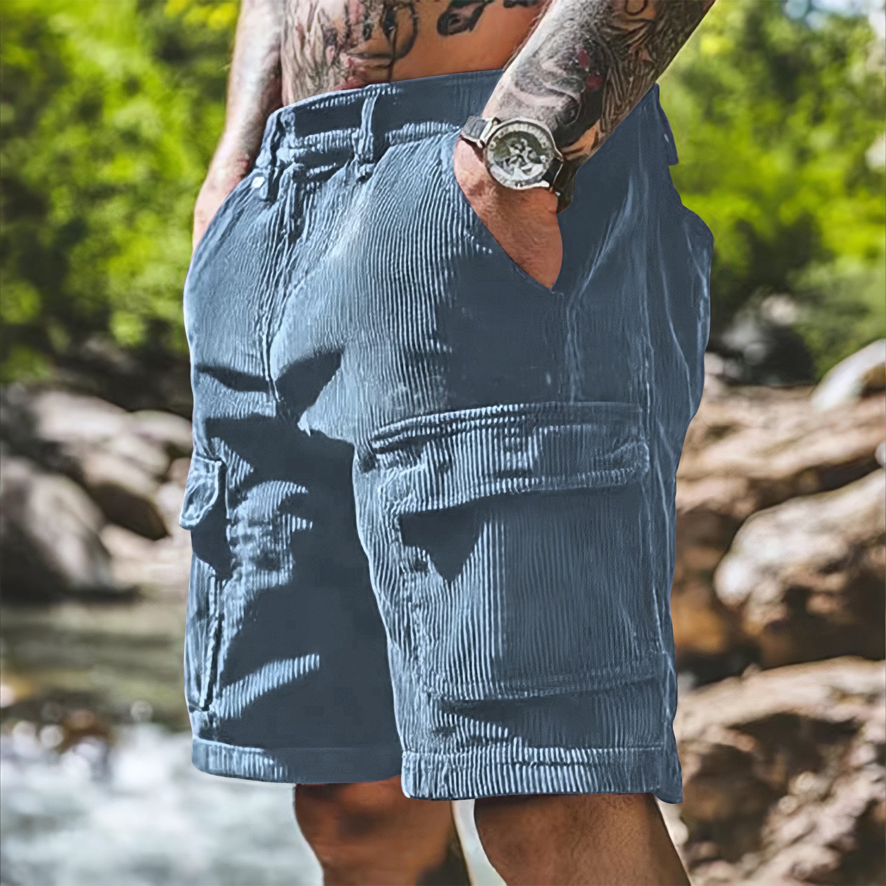 Person wearing blue shorts with a natural background
