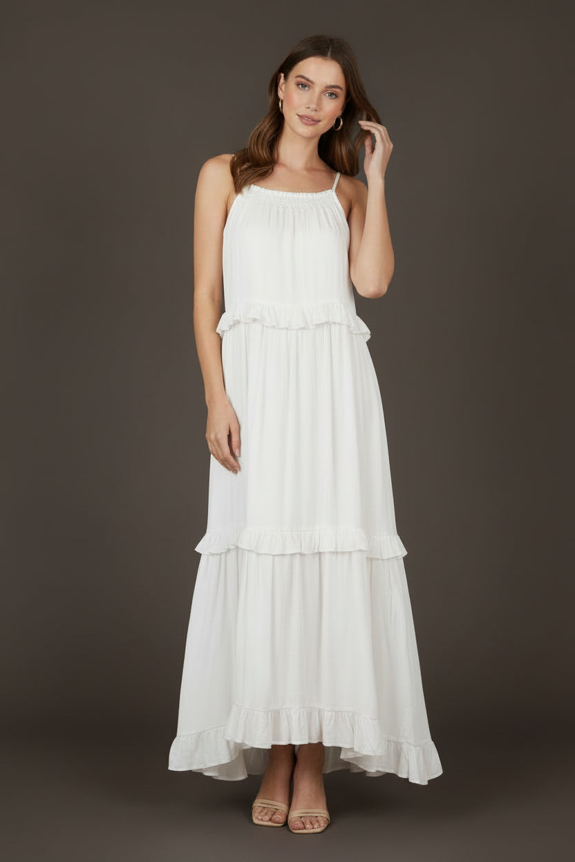 White dress with thin straps on a white background