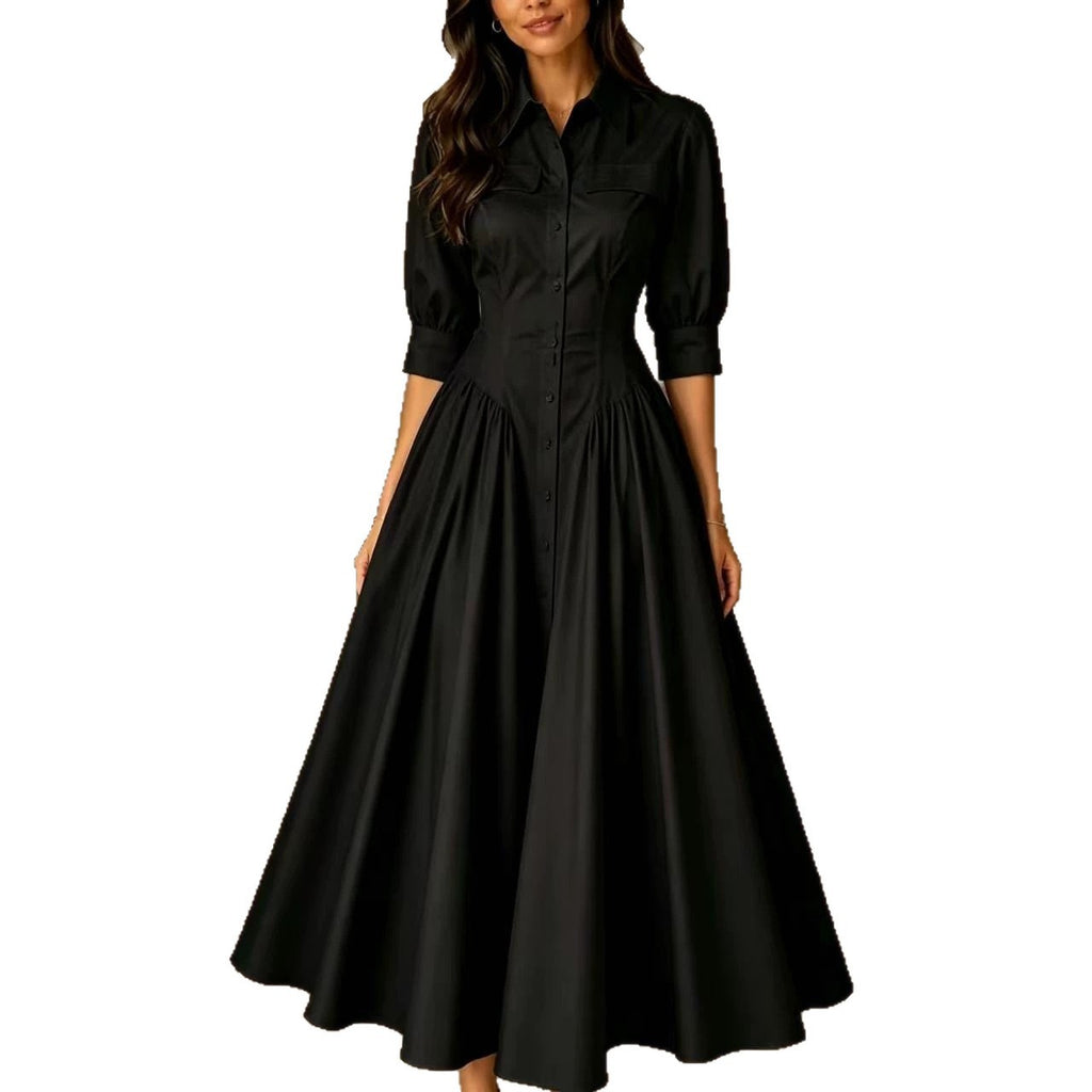 Black dress with long sleeves on a white background