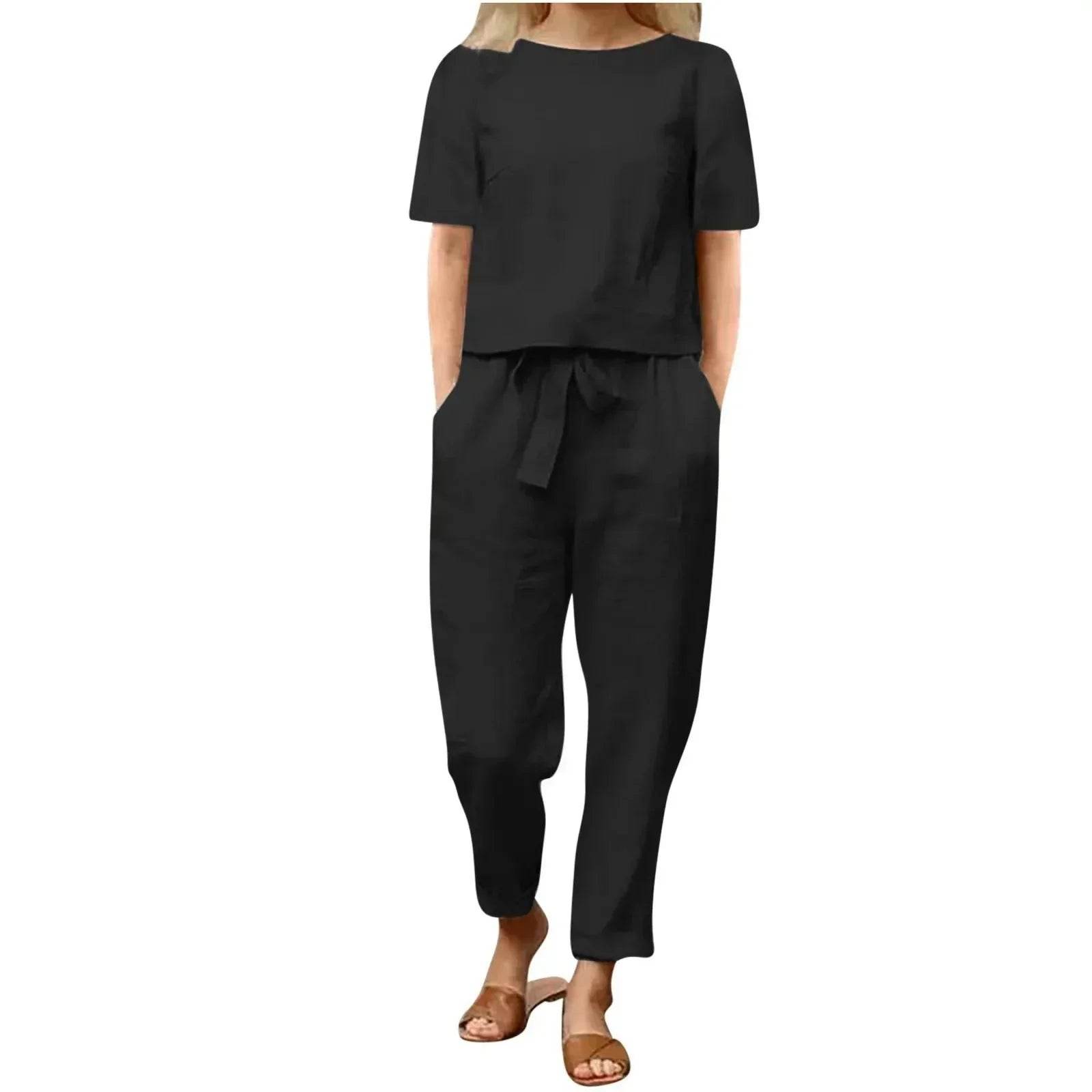Woman wearing black short-sleeve top and high-waist pants set from ZA-Zola UK fashion
